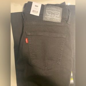 Men’s black Levi’s jeans. 514 straight fit